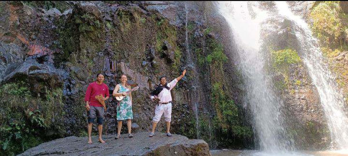 Charango Lessons at Taxopamba Waterfall, Ecuador